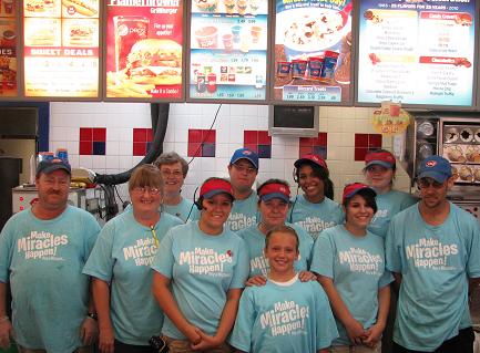 (Above) The DQ Staff takes time out for a picture