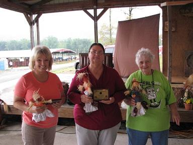 (Above) 1st place E-Z Man Pleasin Coconut Cream Pie Darlene O'Connor 2nd Place Pecan Pie Joy Dobbins 3 rd Place Bev Bittle