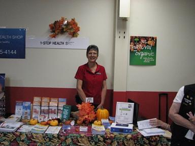 (Above) One Stop Health Shop's Eve hands out a lot of information