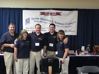 (Above) Taylor Hearing crew takes time out for a picture