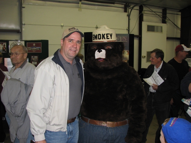 (Above) Bob Connell and Smokey Bear
