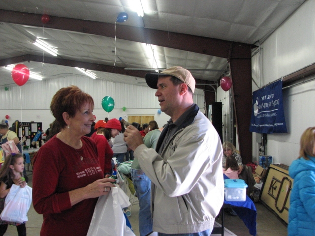 (Above) Pat Reed and Bob Connell talk about the Fair