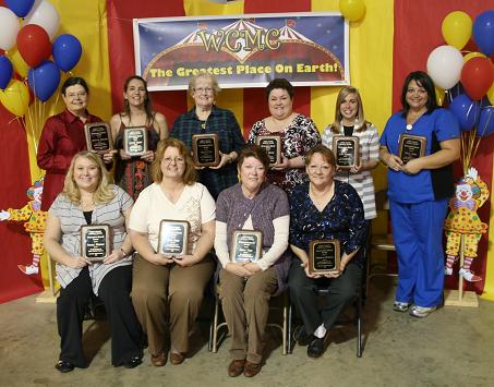 Recipients of a 2011 Outstanding Service Award include (standing, l-to-r) JoyLynn Edwards, MT, Laboratory; Crystal Grimes, LPN, 3 North; Nellie Evans, Patient Financial Services, South Campus; Donna McCoy, Phlebotomist, Laboratory; Anna Overbay, Events Specialist, Marketing; Maria Smith, RN, Compass; and (seated, l-to-r) Crystal Whitener, Patient Financial Services, North Campus; Terry Smith, Supervisor, Materials Management; Bobbie Viall, Preschool 2 Teacher, Child Development Center; and Deborah Burgess, Supervisor, Dietary North Campus. Outstanding Service Award recipients not pictured are Glenda Light, Clinical Director, Clearview; and Tammy McCann, Health Information Technician, Medical Records. Recipients of a 2011 Outstanding Service Award include (standing, l-to-r) JoyLynn Edwards, MT, Laboratory; Crystal Grimes, LPN, 3 North; Nellie Evans, Patient Financial Services, South Campus; Donna McCoy, Phlebotomist, Laboratory; Anna Overbay, Events Specialist, Marketing; Maria Smith, RN, Compass; and (seated, l-to-r) Crystal Whitener, Patient Financial Services, North Campus; Terry Smith, Supervisor, Materials Management; Bobbie Viall, Preschool 2 Teacher, Child Development Center; and Deborah Burgess, Supervisor, Dietary North Campus. Outstanding Service Award recipients not pictured are Glenda Light, Clinical Director, Clearview; and Tammy McCann, Health Information Technician, Medical Records.
