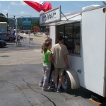 Folks line up for Petit Jean Hot Dogs and Ice Cold Pepsi
