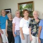Artists hung a new exhibit at Ozark Health Medical Center Monday. Exhibit committee included (from left): Joyce Hartmann; Jan Cobb, Kathryn Jones, Freda May, Judy Shumann, Diana Foote, and Mary Shelton.