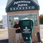 Mountain Mudd Owner Stuart Willibey with the Mountain Mudd mascot, Cuppy. Look for Cuppy at Trick-or-Treat on the Square on Halloween night.