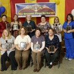 Recipients of a 2011 Outstanding Service Award include (standing, l-to-r) JoyLynn Edwards, MT, Laboratory; Crystal Grimes, LPN, 3 North; Nellie Evans, Patient Financial Services, South Campus; Donna McCoy, Phlebotomist, Laboratory; Anna Overbay, Events Specialist, Marketing; Maria Smith, RN, Compass; and (seated, l-to-r) Crystal Whitener, Patient Financial Services, North Campus; Terry Smith, Supervisor, Materials Management; Bobbie Viall, Preschool 2 Teacher, Child Development Center; and Deborah Burgess, Supervisor, Dietary North Campus. Outstanding Service Award recipients not pictured are Glenda Light, Clinical Director, Clearview; and Tammy McCann, Health Information Technician, Medical Records.