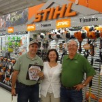 Bob, Renee, and the Sthil Rep take time our for a picture