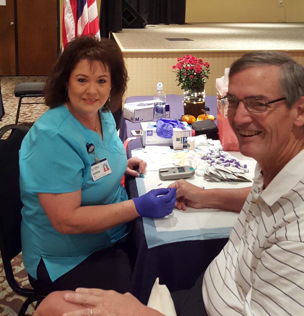 Karen with Unity Health from Searcy test Mayor Paul Wellenberger