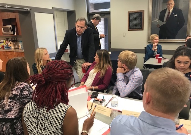 (Pictured: U.S. Senator John Boozman visits with Congressional Youth Cabinet participants during the opening meeting at the Arkansas State Chamber of Commerce.)